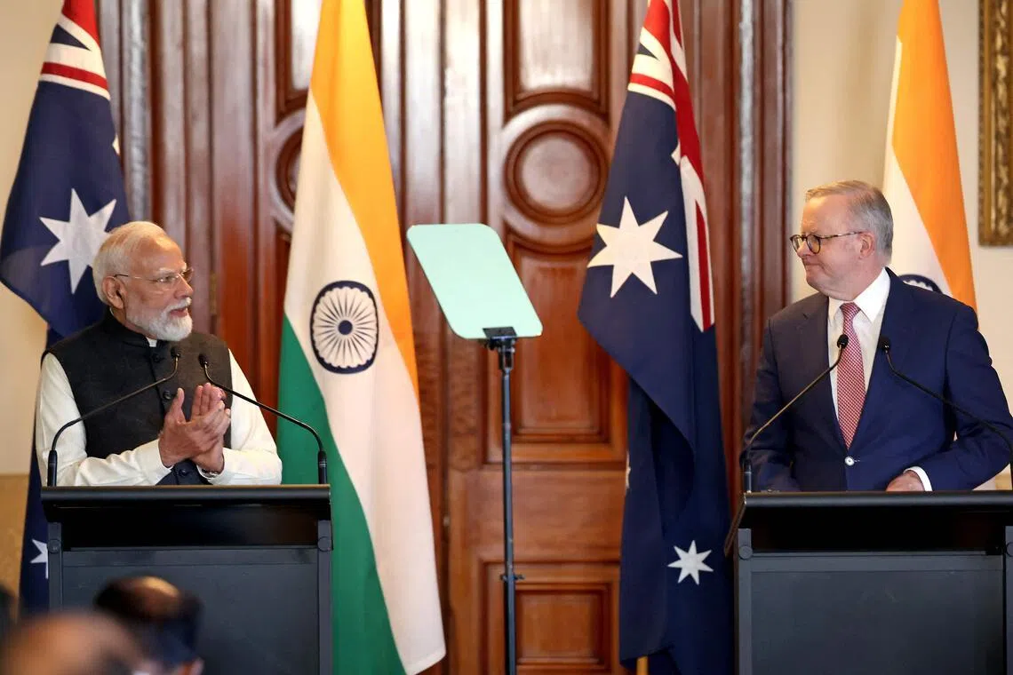 Modi inks uranium and defence deals 
with Australia amid regional anxieties