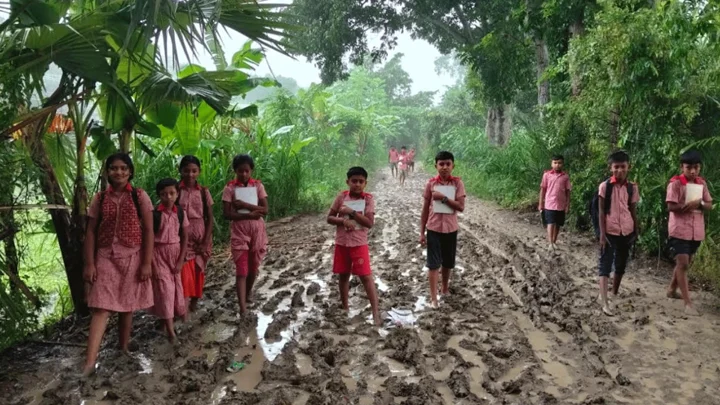 কাদা-পানি মাড়িয়ে স্কুলে যাওয়া, ২৯ বছরেও পাকা হয়নি একমাত্র রাস্তা