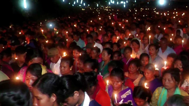 হাজারো মোমবাতির আলোয় আলোকিত শেরপুরের গারো পাহাড়